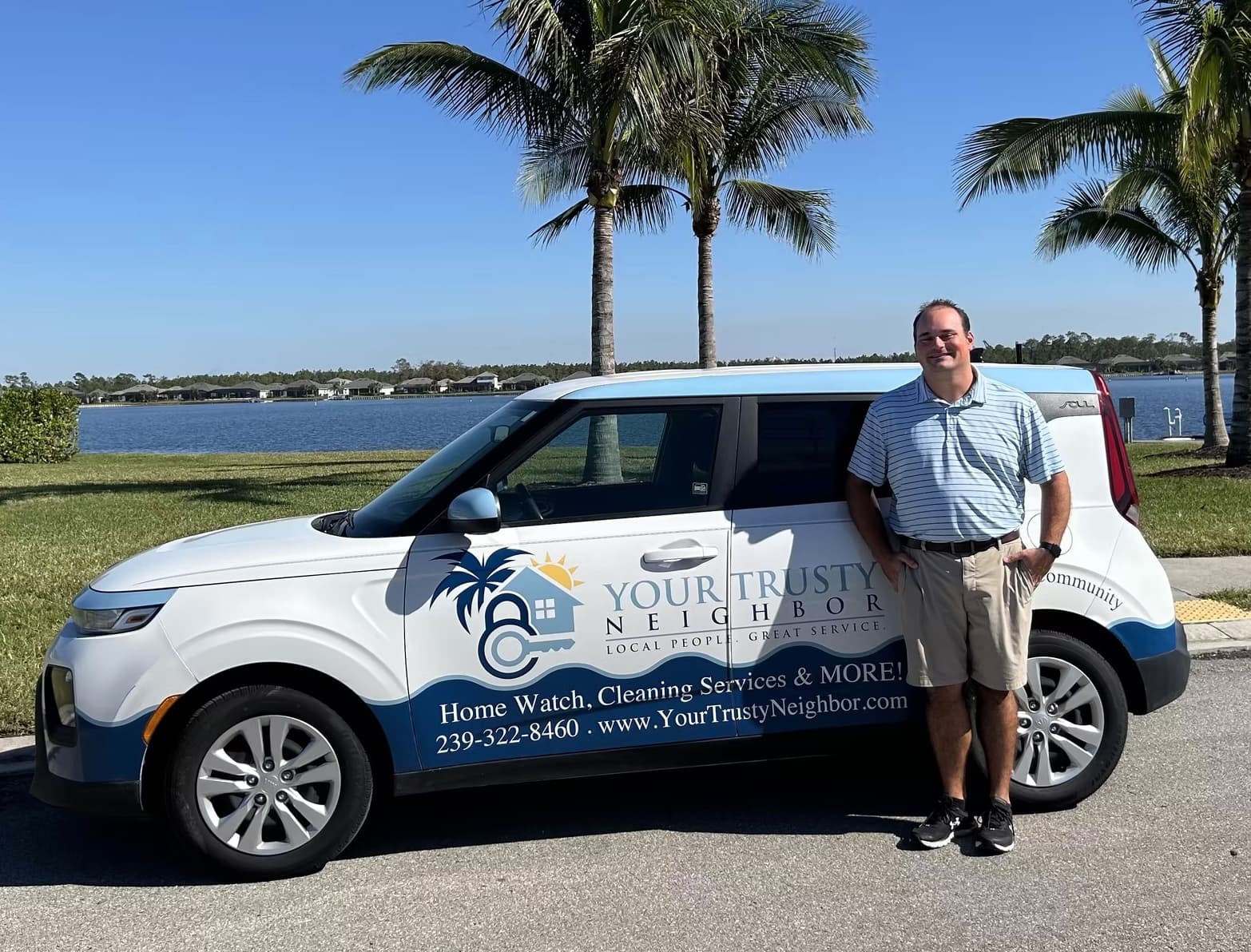 Your Trusty Neighbors representative with the branded home-watch service vehicle